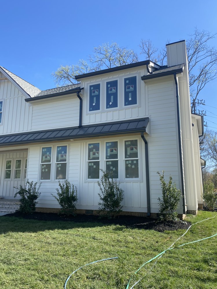 Single-story brick ranch with new gutter installation