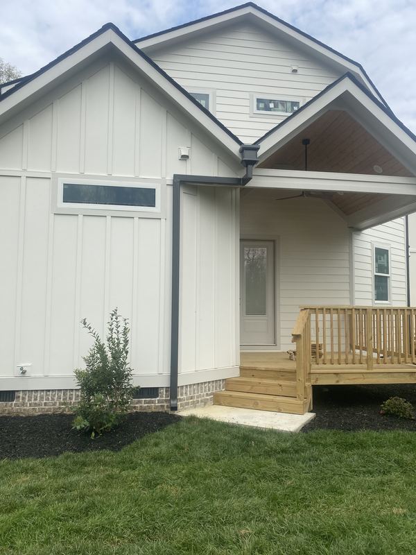 White home with new gutters