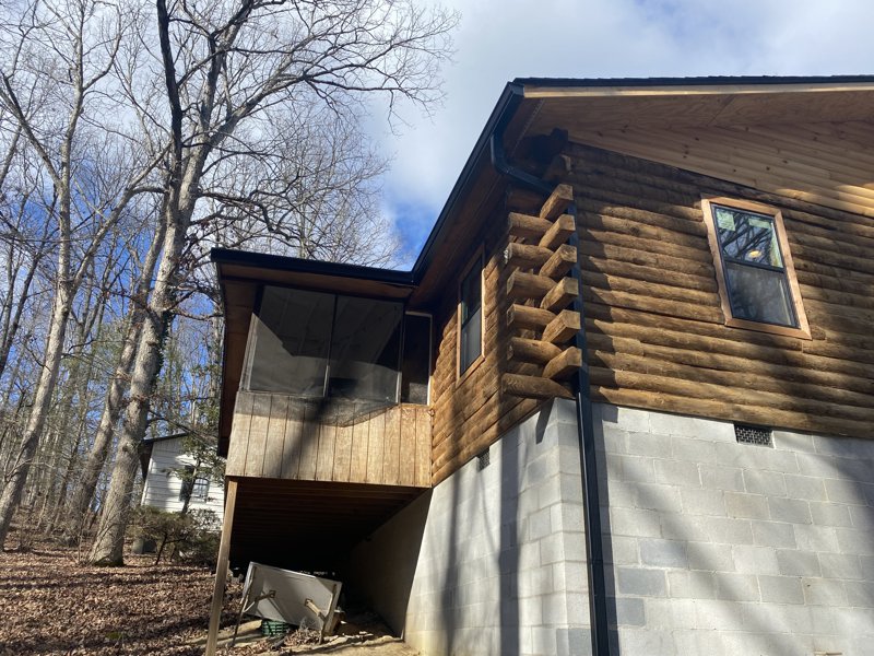 Modern home with seamless gutters and covered porch